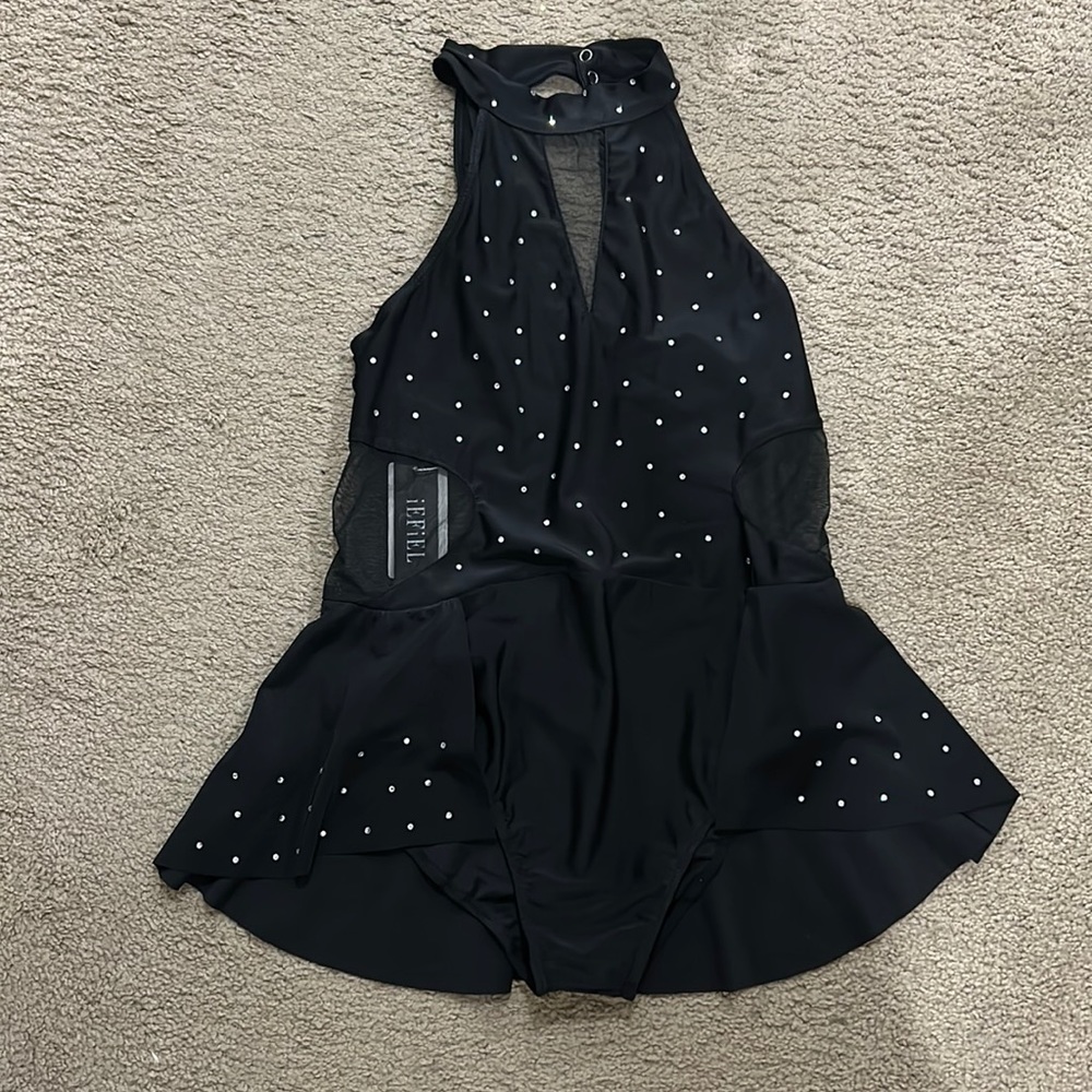 Came too late, never used and the tags are still on, solo dance Leotard